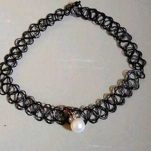 A black and a pearl choker